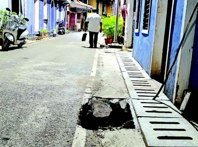 Concrete slab goes down  the drain in Panjim